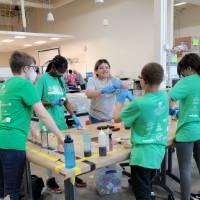 campers working on their planes